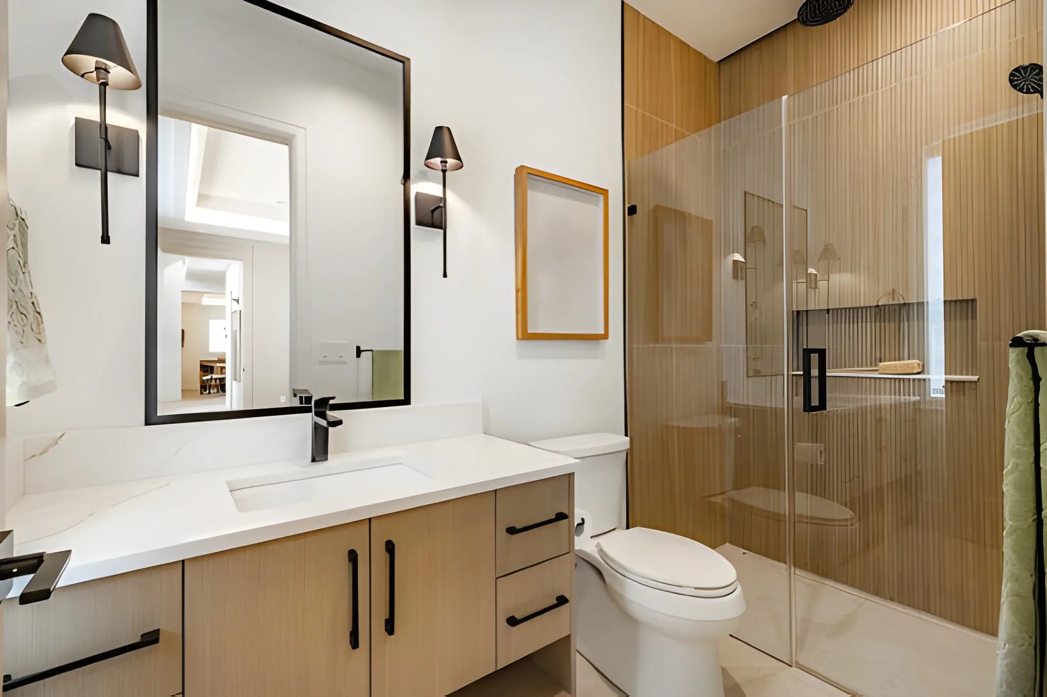 Home Improvement Contractor delivering a modern kitchen transformation with upgraded cabinets and lighting
